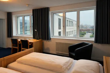 Unsere Zimmer bieten einfachen Komfort in einer ruhigen und entschleunigenden Umgebung.